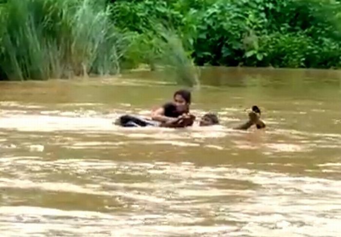 Andhra woman wades through river to write exam